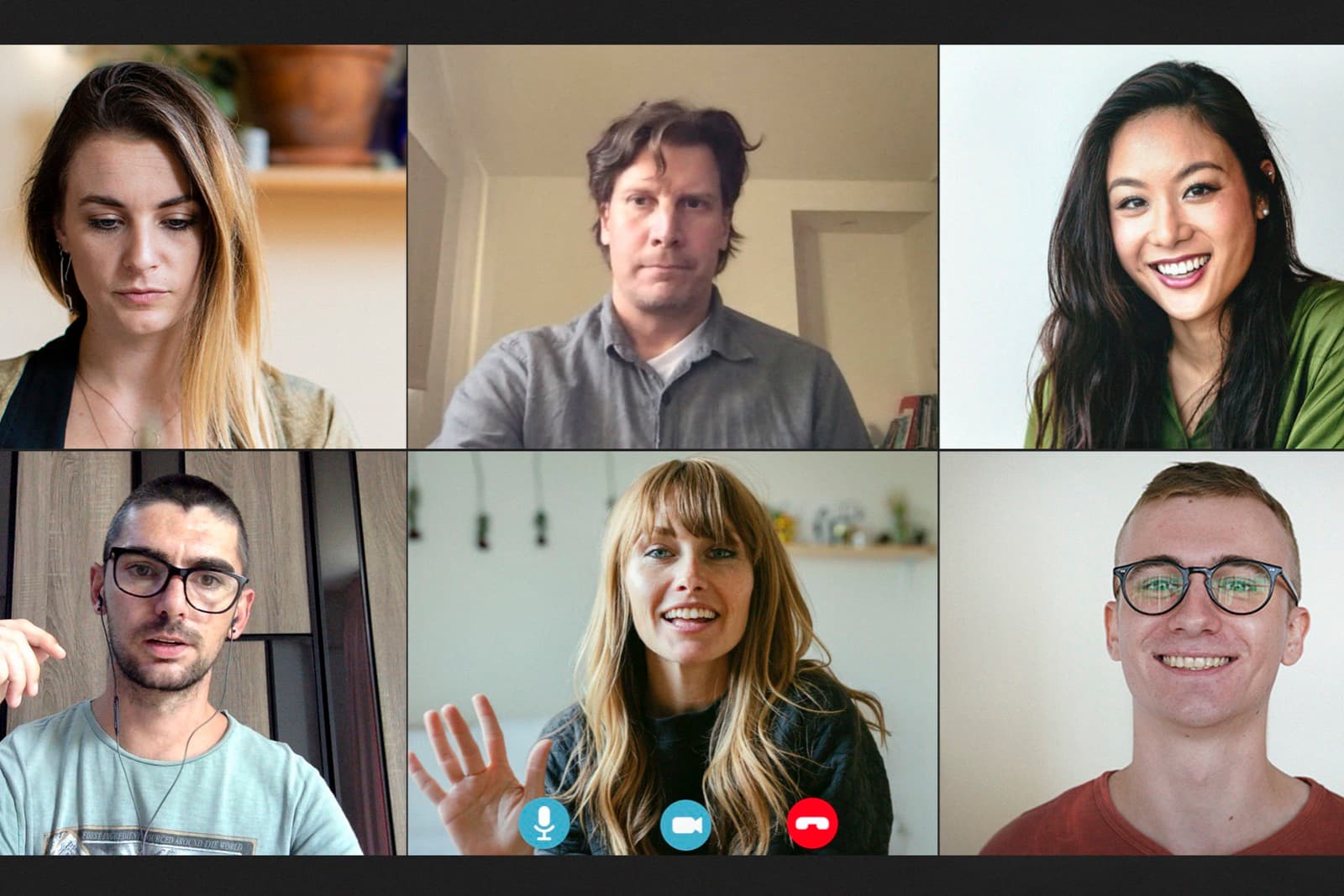 Participants on a video call, each face and hand gesture visible in its own tile